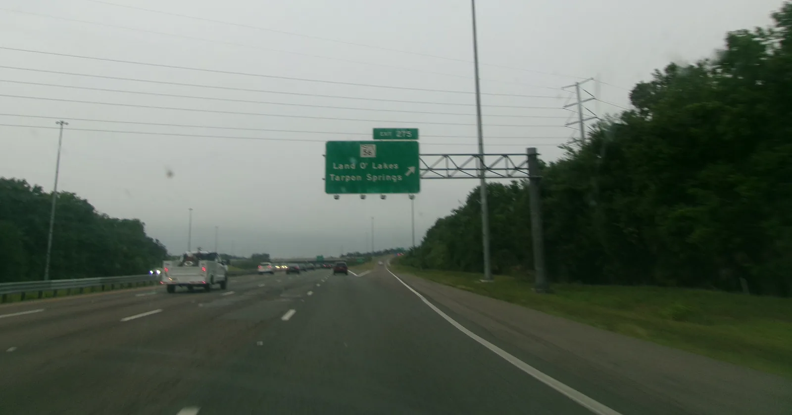 Southbound Interstate 75 in Wesley Chapel approaching an exit sign for State Road 54