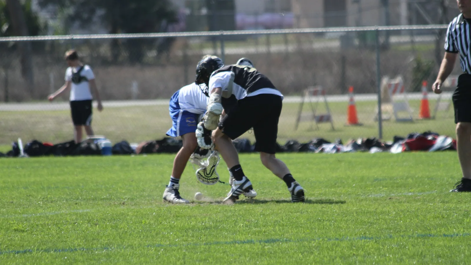 Young lacrosse players at a jamboree on the fields at Wesley Chapel District Park