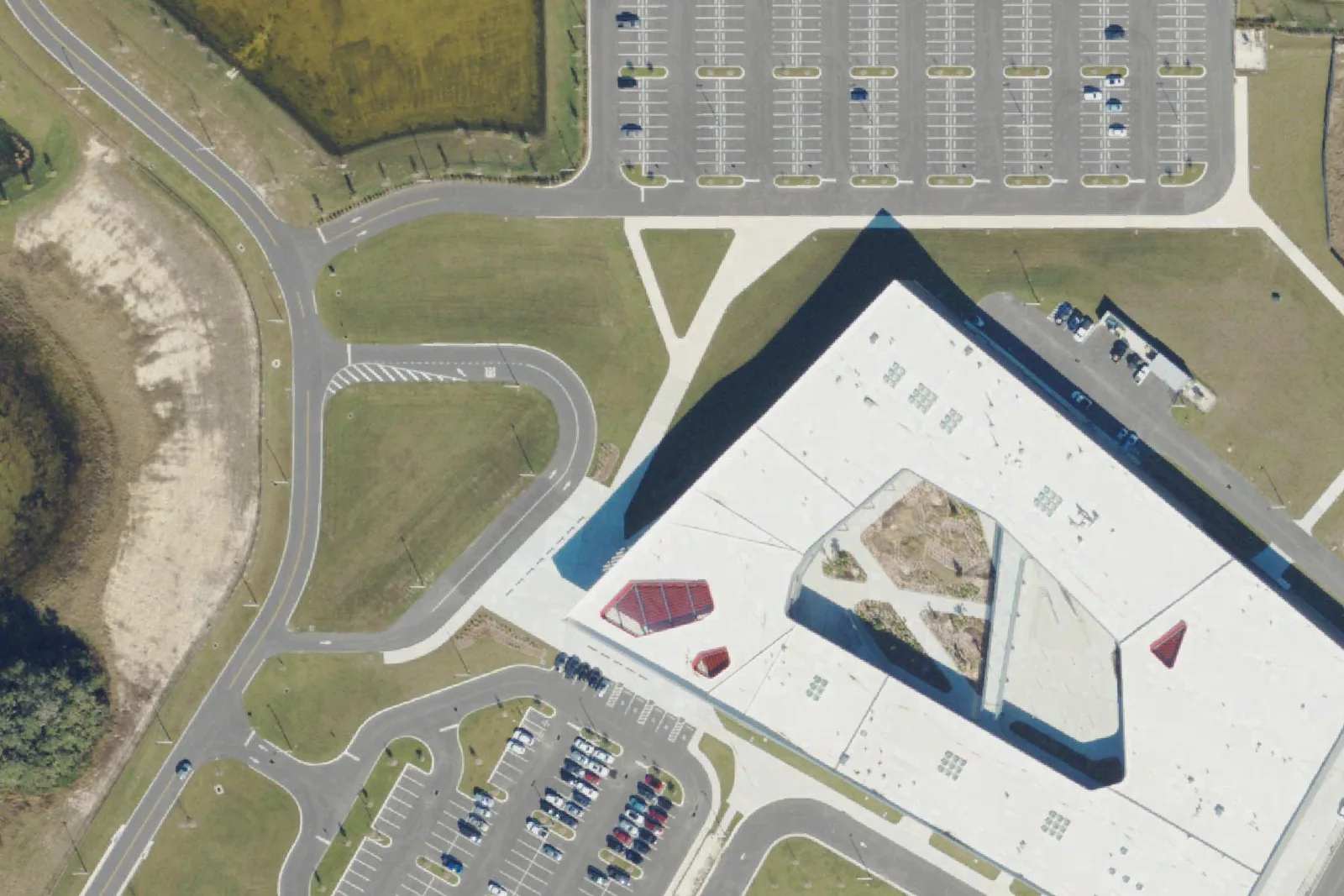 Kirkland Ranch Academy of Innovation's main building and parking lots on Innovation Drive, seen from the air.