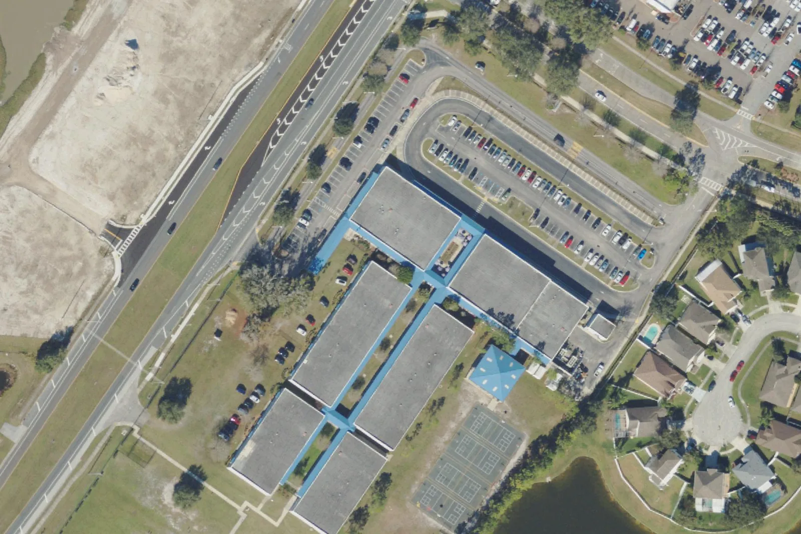 Veterans Elementary School's classroom buildings, courts and parking lot on Progress Parkway in Wesley Chapel, seen from the air.